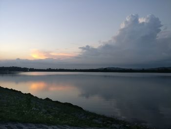 Scenic view of lake against sky during sunset