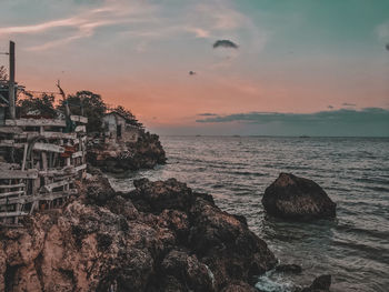 Scenic view of sea against sky during sunset