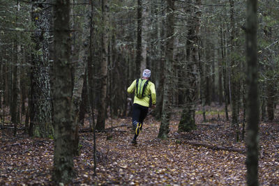 Man running in forest