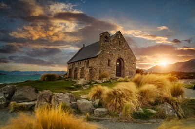 Castle against sky during sunset