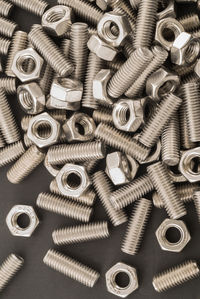 Close-up of nuts and bolts on table