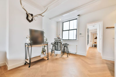 Empty chairs on table at home