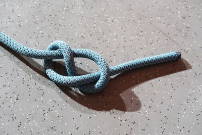 High angle view of rope on table