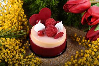 High angle view of red berries on table