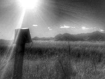 Close-up of illuminated lights against sky