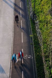 People riding a bike on the street in bilbao city spain, mode of transport