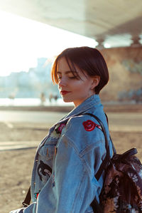 Portrait of woman standing outdoors