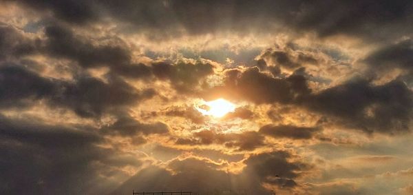 Low angle view of clouds in sky during sunset