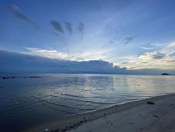 Scenic view of beach against sky during sunset