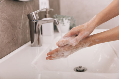 Cropped image of hands with soap sud