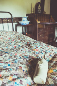 Close-up of bed in bedroom
