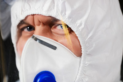 Portrait of man wearing mask