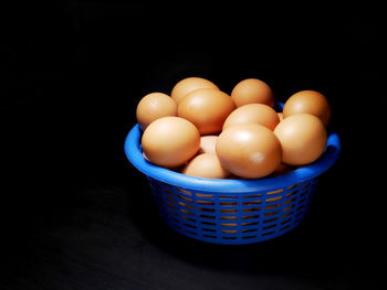 High angle view of eggs in basket