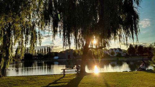 Scenic view of sunset over lake