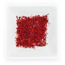 High angle view of red chili peppers in plate