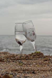 View of drinking glass on beach
