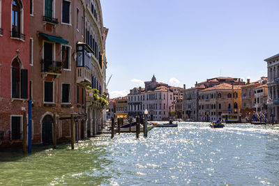 Canal passing through city buildings