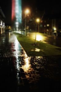 Wet street at night