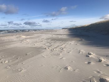 Scenic view of beach against sky