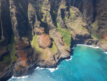 High angle view of rock formation by sea