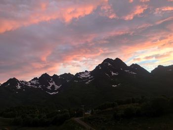 Scenic view of mountains against sky during sunset