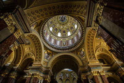 Low angle view of ornate ceiling in historic building