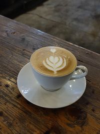 High angle view of cappuccino on table