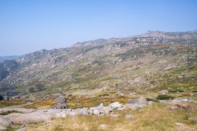 Scenic view of rocky mountains against clear sky