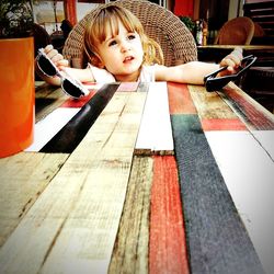 Boy and girl on table