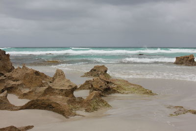 Scenic view of beach against sky