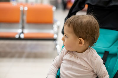 Portrait of cute boy looking away