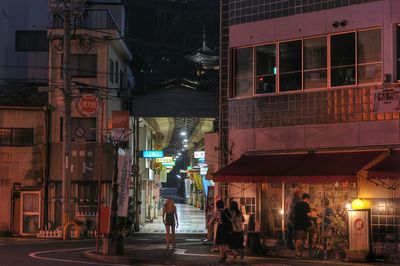 View of illuminated buildings at night