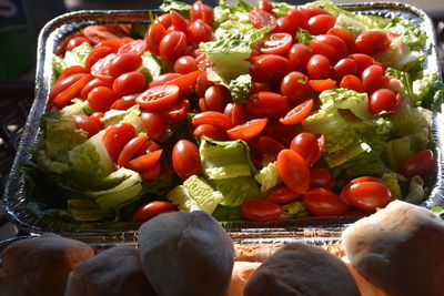 High angle view of tomatoes and red bell peppers