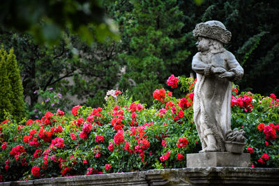 Statue of people in park