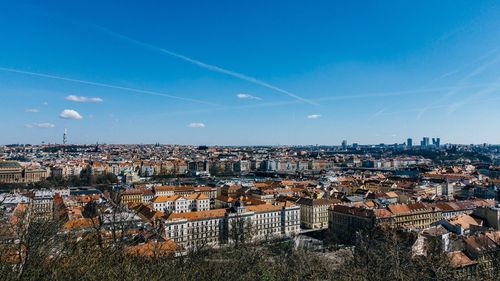 Aerial view of cityscape against sky