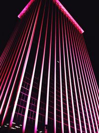 Low angle view of illuminated building at night