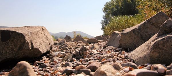 Rocks on shore against sky