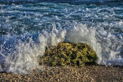 High angle view of waves in sea