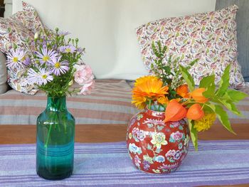 Close-up of flower vase on table