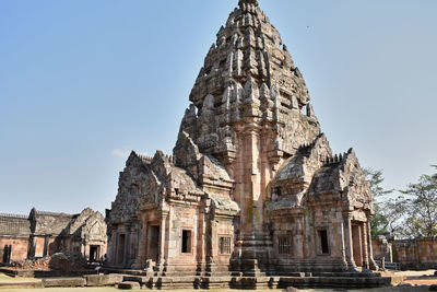 Old temple building against clear sky