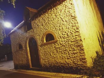 Illuminated old building at night