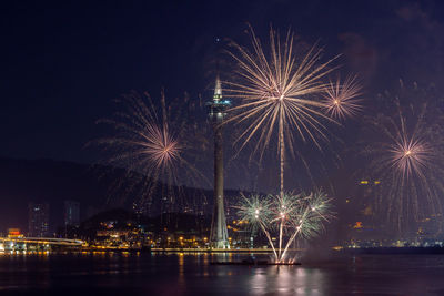 Firework display at night