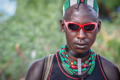 Portrait of young man wearing sunglasses