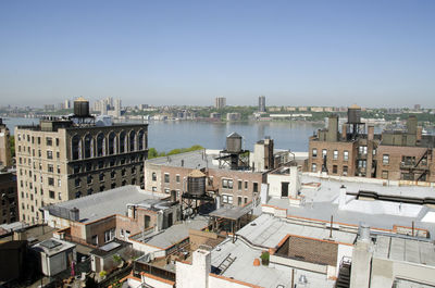 High angle view of buildings against clear sky