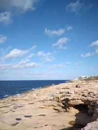 Scenic view of beach against sky