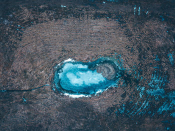 High angle view of ice on rocks