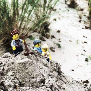 Close-up of toy on rock