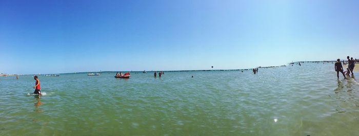 Scenic view of calm sea against clear sky