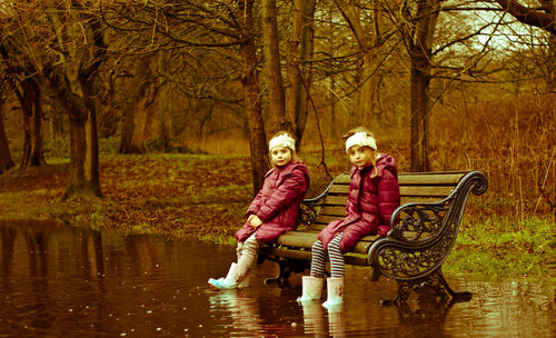 Woman sitting in lake