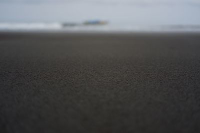 Surface level of road on beach